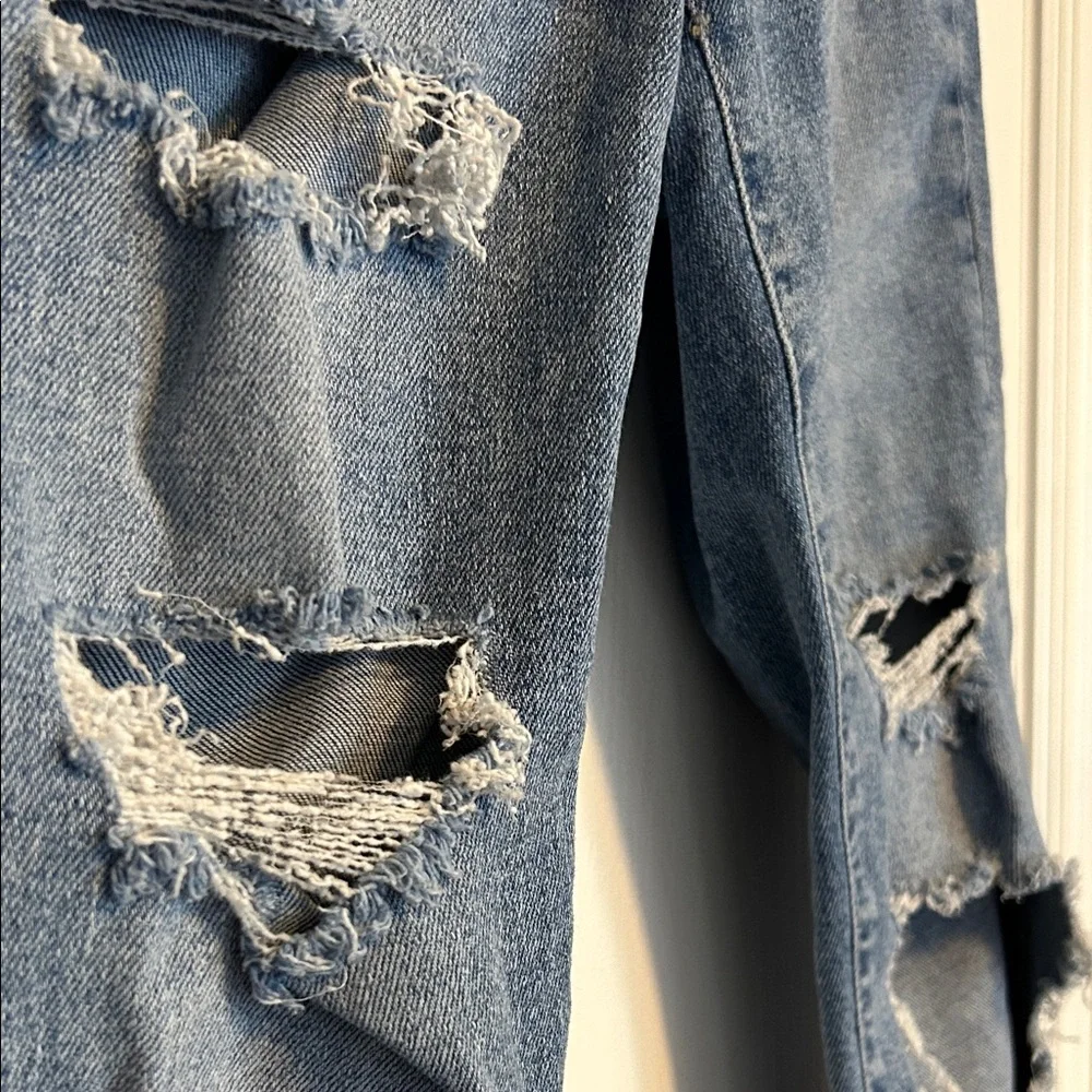 Classic Distressed Skinny Jeans in Blue size 4